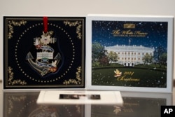 The 2024 White House Christmas Ornament featuring former U.S. President Jimmy Carter, is displayed at the White House Historical Association in Washington, Feb. 21, 2024. Carter is the first president to be honored — while living — with an official White House Christmas ornament.