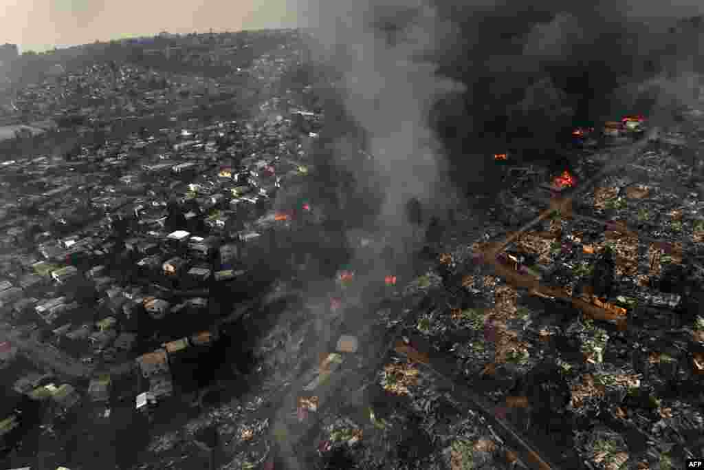 Aerial view of the forest fire that burnt the hills of the city of Viña del Mar in the Las Pataguas sector, Chile, Feb. 3, 2024.&nbsp;The region of Valparaoso and Viña del Mar in central Chile woke up with a partial curfew to allow the movement of evacuees and the transfer of emergency equipment in the midst of a series of unprecedented fires, authorities reported.