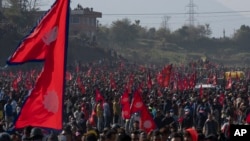 Protesters participate in a rally demanding a restoration of Nepal's monarchy in Kathmandu, Nov. 23, 2023.