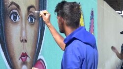 هونەرمەندانی سەر شەقام گۆڕانکاری لە سیمای ناوچەی مێژوویی کازمیە لە بەغدا دەکەن