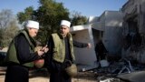 Druze faith leaders tour Kibbutz Kfar Azza with their Muslim, Jewish and Christian counterparts ahead of an interfaith prayer near the Israel-Gaza border, the site of an Oct. 7 cross-border attack by Hamas who killed some 1,200 people, Nov. 29, 2023.