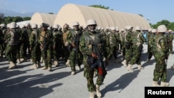 Members of the first contingent of Kenyan police are seen after arriving in the Caribbean country as part of a peacekeeping mission, in Port-au-Prince, Haiti, June 26, 2024.