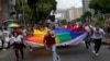 ARCHIVO - Juerguistas participan en la marcha del Orgullo Gay en Caracas, Venezuela, el domingo 2 de julio de 2023. (Foto AP/Matias Delacroix)