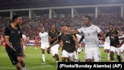 South Africa's Teboho Mokoena, right, celebrates with teammates after scoring his sides second goal during the African Cup of Nations round of 16 soccer match between Morocco and South Africa, at the Laurent Pokou stadium in San Pédro, Ivory Coast, Tuesday, Jan. 30, 2024. (AP)