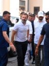 India's opposition Congress Party leader Rahul Gandhi, second-left, arrives at a court in Surat, India, March 23, 2023.