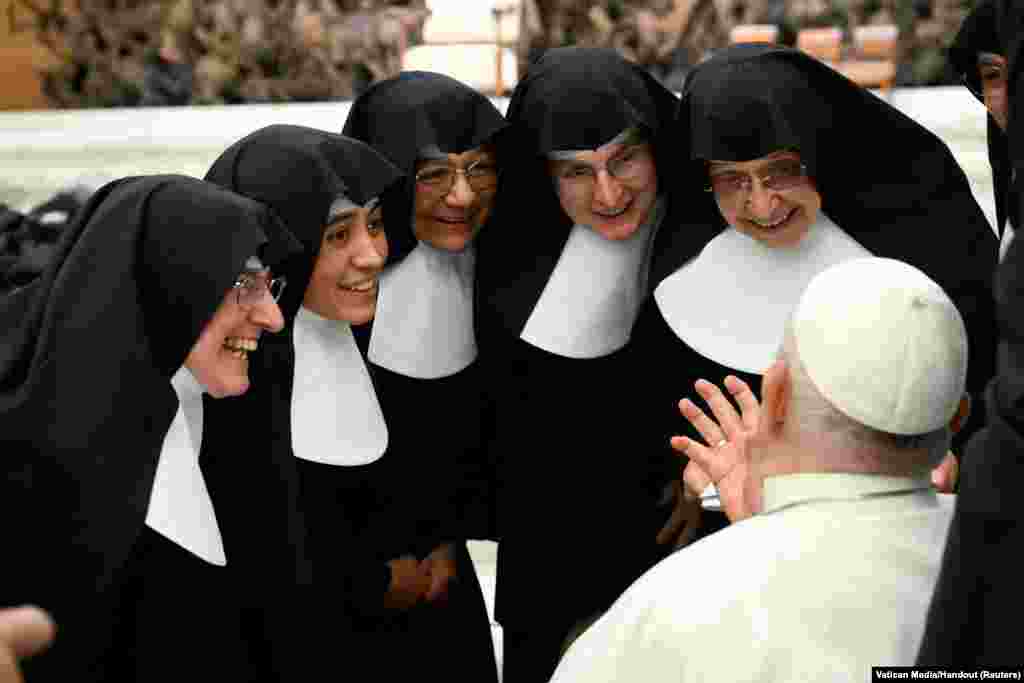 Pope Francis speaks to nuns during the weekly general audience, in Paul VI hall at the Vatican.