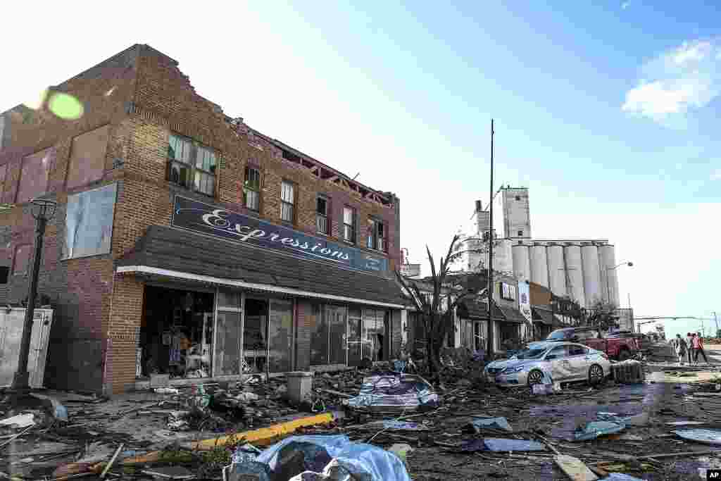 Buildings and vehicles show damage after a tornado struck Perryton, Texas, June 15, 2023.