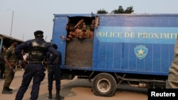 FILE - New inmates are seen on a truck outside Makala prison in Kinshasa, Democratic Republic of Congo, July 27, 2024. Several inmates were reportedly shot dead on Sept. 2, 2024, during an attempted escape from the penal facility, the country's largest.