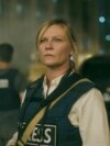 This image released by A24 shows Kirsten Dunst in a scene from 'Civil War'. (A24 via AP)