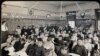 First- and second-grade students at the Genoa Indian School appeared anxious in a photo taken in 1910.