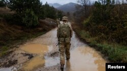 British troops patrol the Kosovo-Serbia border in Jarinje, Kosovo, Nov. 24, 2023.