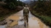FILE - British troops patrol the Kosovo-Serbia border in Jarinje, Kosovo, Nov. 24, 2023. Twenty-five years ago, NATO launched an air campaign to stop ethnic cleansing by Serbian forces against ethnic Albanians in Kosovo, then a province of Serbia in the former Yugoslavia. 