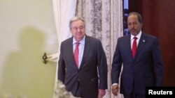 UN Secretary-General Antonio Guterres and Somali President Hassan Sheikh Mohamud arrive for a joint news conference at the Presidential palace in Mogadishu, Apr. 11, 2023.