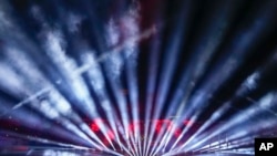 The Jorge "El Magico" Gonzalez stadium is illuminated during the opening ceremony of the Central American and Caribbean Games, in San Salvador, El Salvador, June 23, 2023.