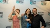 FILE - Mississippi Today reporter Anna Wolfe, center, celebrates winning the 2023 Pulitzer Prize for Local Reporting, accompanied by her mother, Bethel Wolfe, left, and father, Chris Wolfe, in Jackson, May 8, 2023.