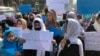 FILE - Afghan women protest during a demonstration in Kabul, Afghanistan, March 26, 2022. The U.N. said April 5, 2023, it cannot accept a Taliban decision to bar Afghan female staffers from working at the agency.