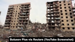 Скриншот из видеоролика на YouTube показывает разрушения Авдеевки в Донецкой области Украины (Butusov Plus via Reuters)