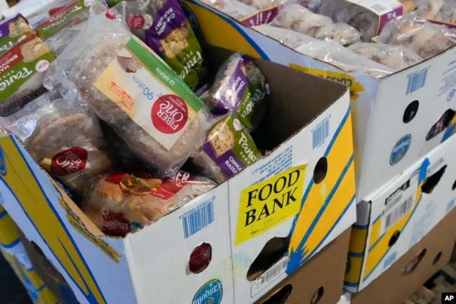 Recovered food is prepared to be distributed at a mobile food bank at Feeding Westchester in Elmsford, N.Y., Wednesday, Nov. 15, 2023. (AP Photo/Seth Wenig)