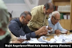 Electoral staff count ballots in Tehran on June 29, 2024, after voting ended in a snap presidential election to choose a successor to Ebrahim Raisi following his death in a helicopter crash. (Majid Asgaripour/West Asia News Agency. via Reuters)
