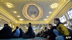 FILE - Muslim worshipers pray during Friday prayers at the Khazrati Imam Mosque in Tashkent, Uzbekistan, Oct. 22, 2021. 