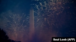 (FILE) Fireworks explode near Washington Monument during event honoring Independence Day in Washington, DC.