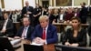 FILE - Former U.S. President Donald Trump, flanked by his lawyers, attends the closing arguments in the Trump Organization civil fraud trial at New York State Supreme Court in the Manhattan borough of New York, Jan. 11, 2024.