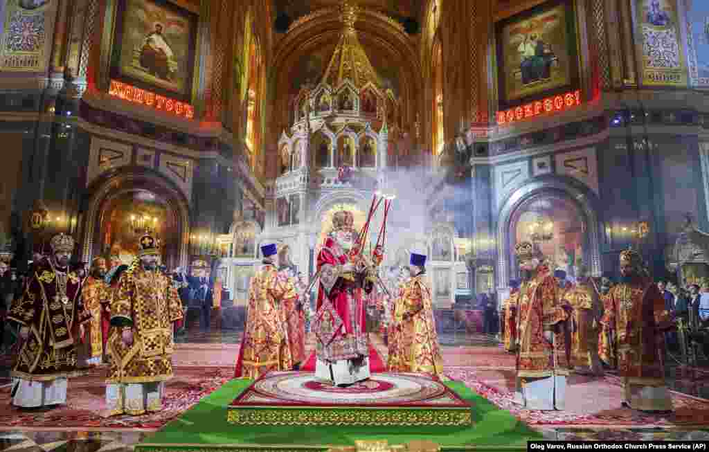 Russian Orthodox Church Patriarch Kirill, center, conducts an Orthodox Easter service in the Christ the Savior Cathedral, in Moscow.