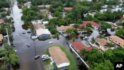 This aerial view taken from video shows a flooded street in Northeast Miami-Dade County, Fla., on June 13, 2024.