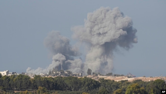 Smoke rises following an Israeli bombardment in the Gaza Strip, as seen from southern Israel on Dec. 4, 2023.