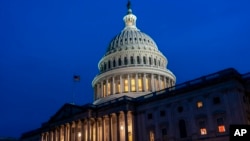 The lights stay on at the U.S. Capitol in Washington on Feb. 9, 2024, as the U.S. Senate settles in for a rare weekend session to work on a package of wartime funding for Ukraine, Israel and other U.S. allies.