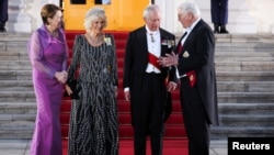Britain's King Charles and Camilla, the Queen Consort, at center, attend a state banquet with German President Frank-Walter Steinmeier and his wife Elke Buedenbender at Bellevue Palace, in Berlin, March 29, 2023.