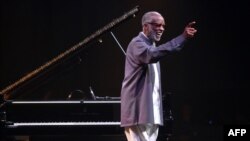 FILE - In this file photo taken on Aug. 4, 2016 US jazz pianist and composer, Ahmad Jamal smiles during a concert in the Marciac Jazz Festival on August 4, 2016 in Marciac, France.