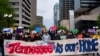 Protesters rally at Legislative Plaza near the Tennessee State Capitol building to urge Governor Bill Lee to veto proposed anti-immigration bills in Nashville, Tennessee, April 4, 2024.