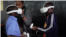 FILE - Various of students using virtual reality (VR) headsets in classroom, playing game about waste collection and waste sorting at the Mcedo Beijing School in Mathare neighborhood in Nairobi, Kenya on May 23, 2023. 