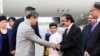 This handout photo taken July 30, 2023, and released by the Pakistan Information Department (PID) shows Pakistan's Interior Minister Rana Sanaullah (2nd R) receiving visiting Chinese Vice Premier He Lifeng (2L) upon his arrival in Islamabad.