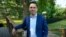 KCCI-TV chief meteorologist Chris Gloninger stands outside his home June 27, 2023, in West Des Moines, Iowa.