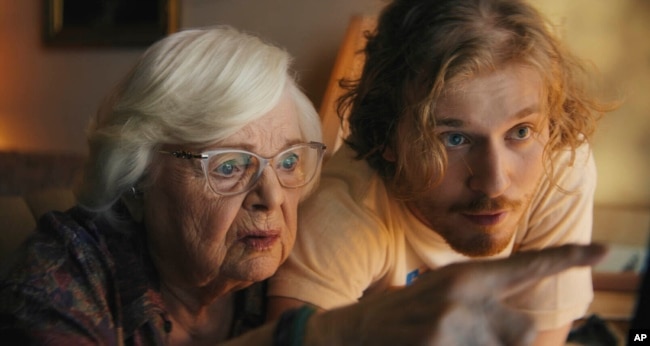 This image released by Magnolia Pictures shows June Squibb, left, and Fred Hechinger in a scene from the film "Thelma." (Magnolia Pictures via AP)