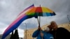 Same-sex marriage supporters take part in a rally at central Syntagma Square, in Athens, Greece, Feb. 15, 2024. Greece's parliament is to vote Thursday to legalize same-sex civil marriage unions, in a first for an Orthodox Christian country.