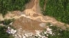 This screengrab from AFPTV aerial video footage taken on Feb. 7, 2024 shows the site of a landslide in Davao de Oro province on Mindanao island in the southern Philippines. 