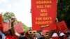 FILE - Ugandas queer activist Papa De raises a fist outside the Uganda High Commission during a picket against the countrys anti-homosexuality bill in Pretoria, South Africa, on April 4, 2023.