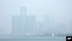 Smoke fills the sky reducing visibility, June 28, 2023, in Detroit. The Detroit area has some of the worst air quality in the United States as smoke from Canada's wildires spreads southward.