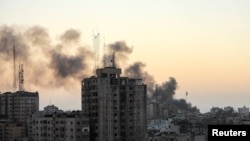 Smoke rises following Israeli strikes in Gaza City, Nov. 7, 2023. 