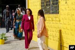 Vice President Kamala Harris, followed by actress Sheryl Lee Ralph, visits the Vibration studio at the freedom skate park in Accra, March 27, 2023.