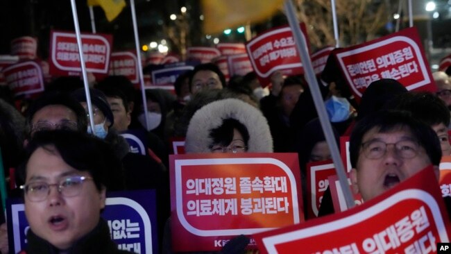 Doctors rally against the government's medical policy near the presidential office in Seoul, South Korea, Feb. 22, 2024.
