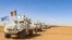 FILE - Chadian Soldiers seen with the United Nations Multidimensional Integrated Stabilization Mission in Mali (MINUSMA) drive in convoys toward the city of Gao, after withdrawing from their bases in Tessalit and Aguelok in the North of Mali. 