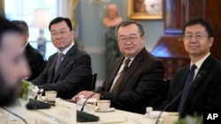 FILE - People's Republic of China CCP International Liaison Department Minister Liu Jianchao, second from right, during a meeting with Secretary of State Antony Blinken at the State Department in Washington, Jan. 12, 2024.