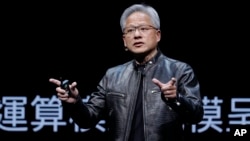 In this file image, Nvidia CEO Jensen Huang speaks at the Computex 2024 exhibition in Taipei, Taiwan, June 2, 2024. (AP Photo/Chiang Ying-ying, File)