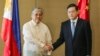 中国外长周六称愿与菲律宾解决分歧
