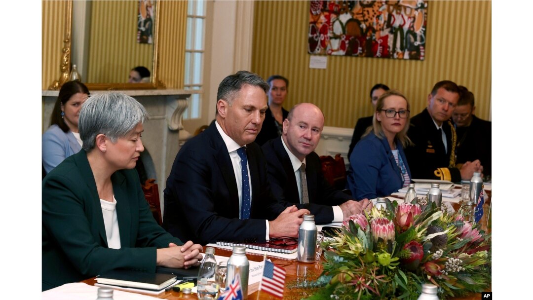 Australia's Defense Minister Richard Marles, second from left, addresses U.S. Secretary of State Antony Blinken and U.S. Secretary of Defense Lloyd Austin as Australia's Foreign Minister Penny Wong, left, looks on during discussions at Queensland Government House in Brisbane, Australia, on July 29, 2023.