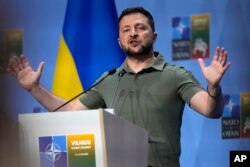 FILE - Ukraine's President Volodymyr Zelenskyy addresses a media conference at a NATO summit in Vilnius, July 12, 2023.